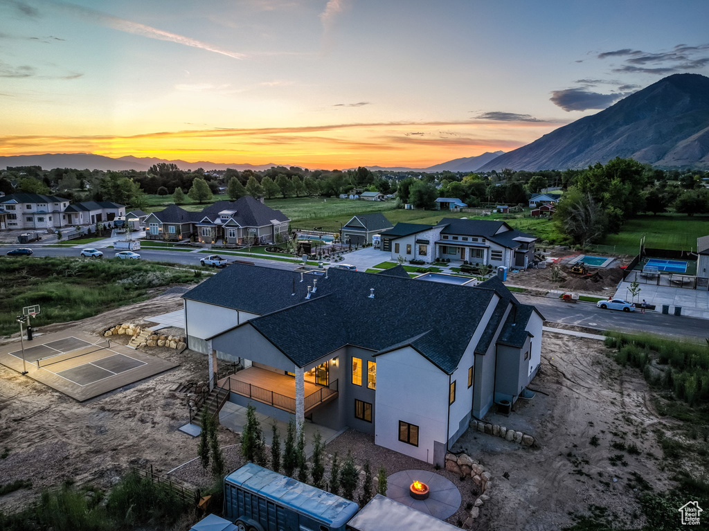 Aerial view at dusk of a mountain view and a residential view