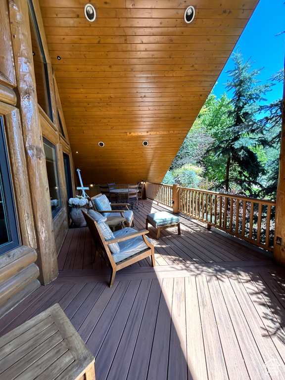 Wooden terrace with outdoor lounge area