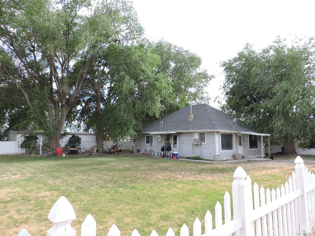 Exterior space with a front yard