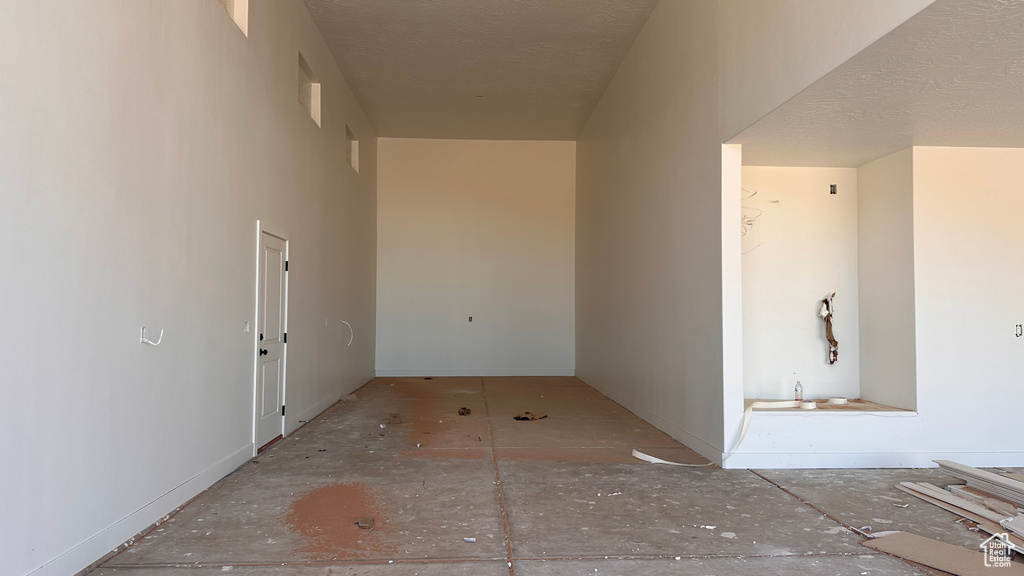 Interior space featuring a textured ceiling