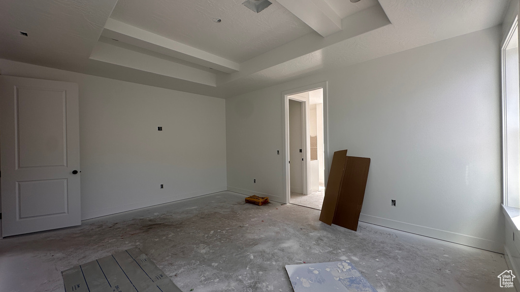 Empty room with a textured ceiling