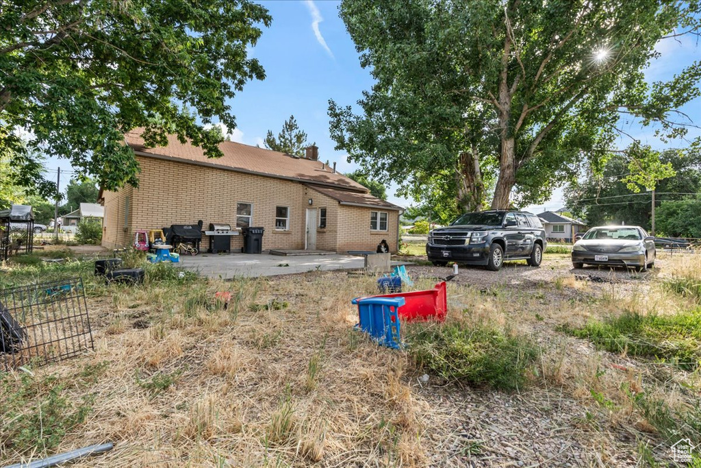 View of yard featuring a patio