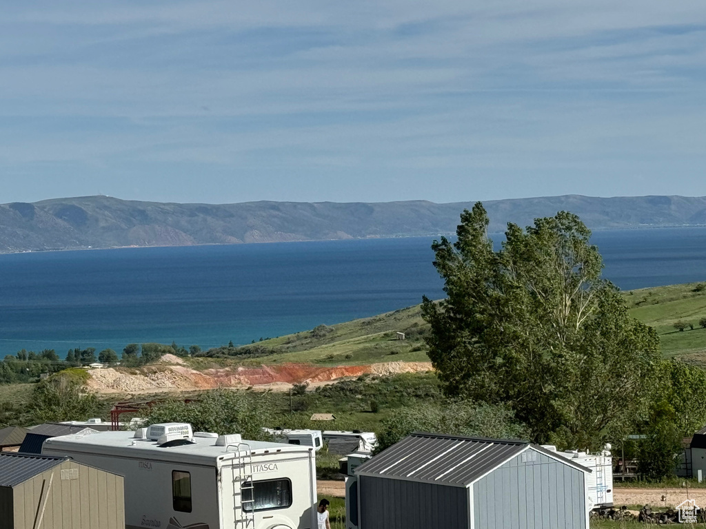 Property view of water with a mountain view