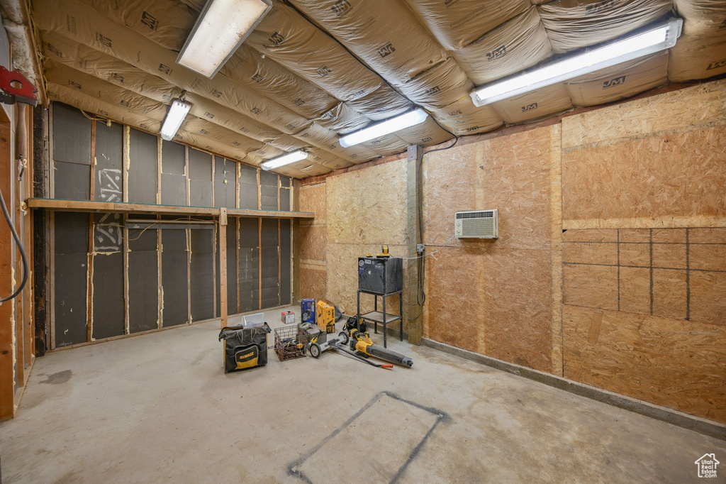 Interior space featuring an AC wall unit