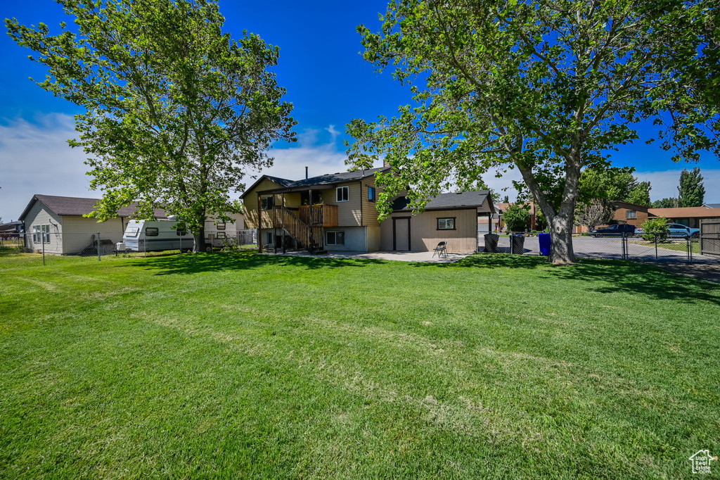 View of yard with a patio