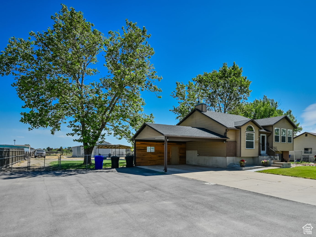 View of front of property with a front lawn