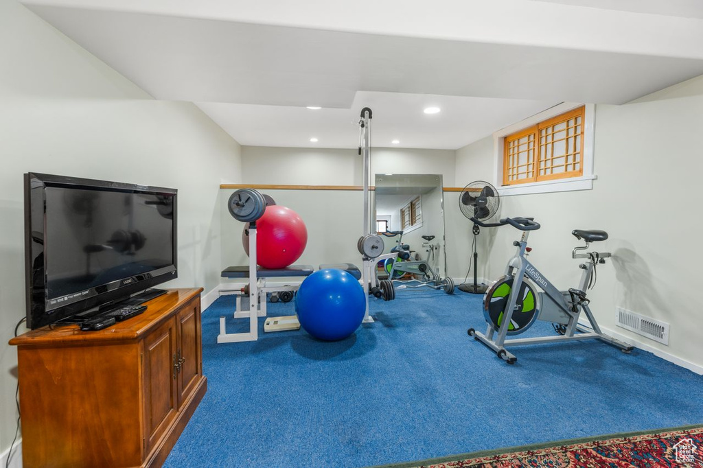 Exercise room featuring carpet