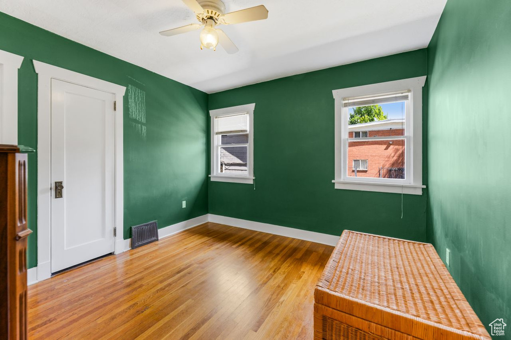 Interior space featuring ceiling fan and hardwood / wood-style flooring