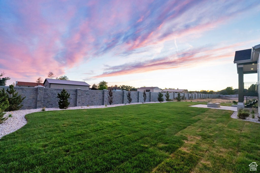 View of yard at dusk