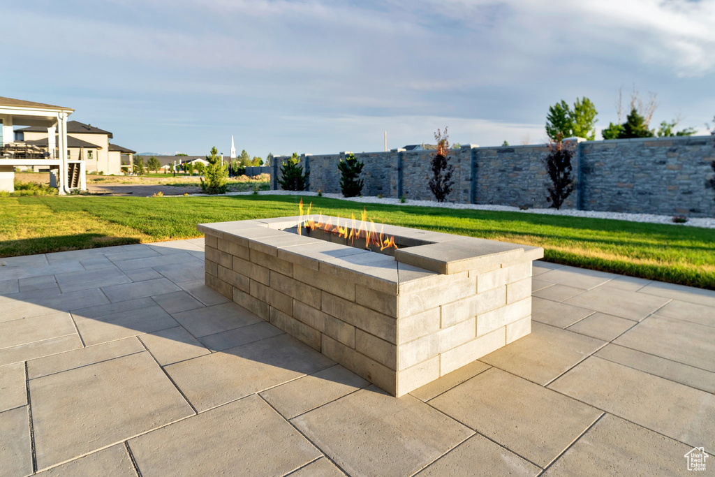 View of patio / terrace with an outdoor fire pit