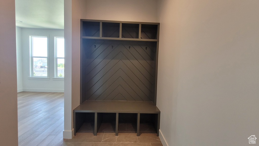 Mudroom featuring wood-type flooring