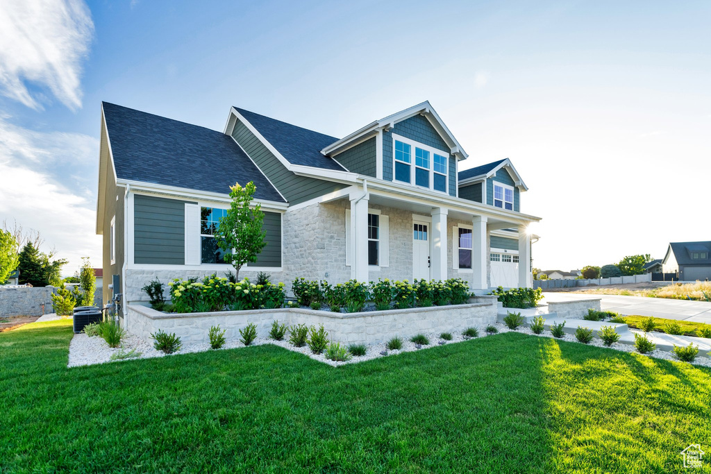 View of front of property with a front lawn