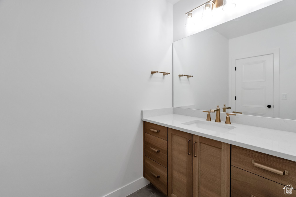 Bathroom with tile floors and vanity