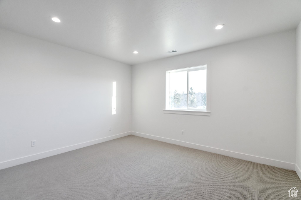 View of carpeted spare room