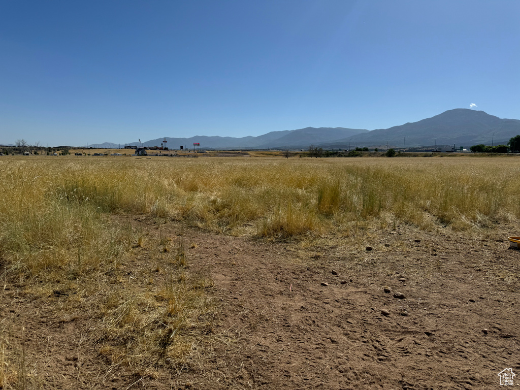 Property view of mountains with a rural view