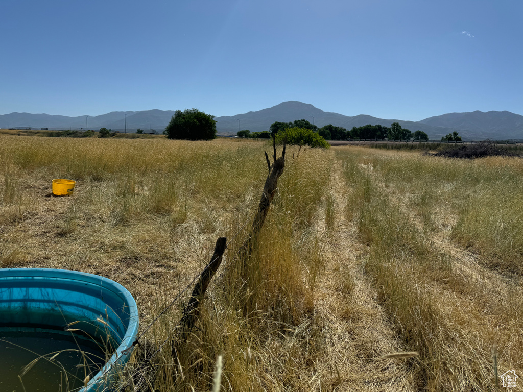 View of nature featuring a mountain view and a rural view