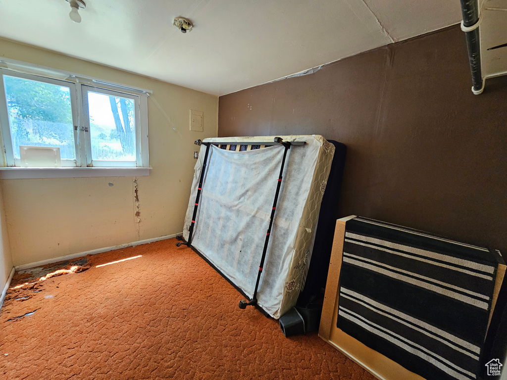 Unfurnished bedroom featuring carpet