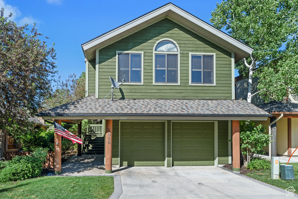 View of front of house with a garage