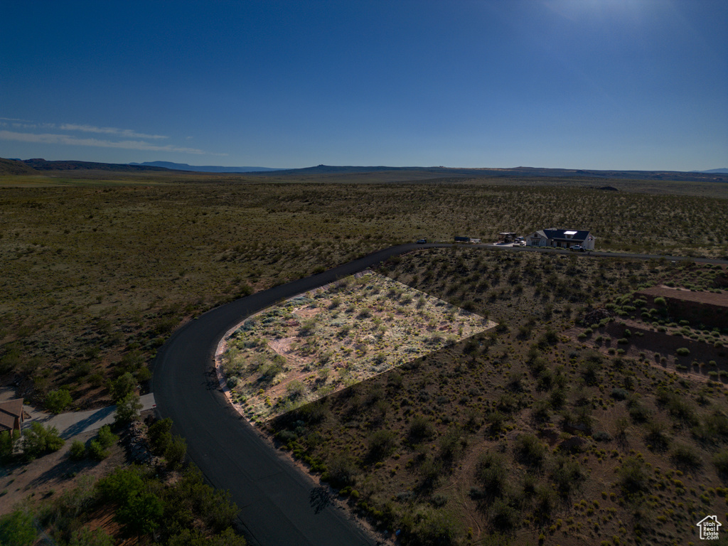 Birds eye view of property with a rural view