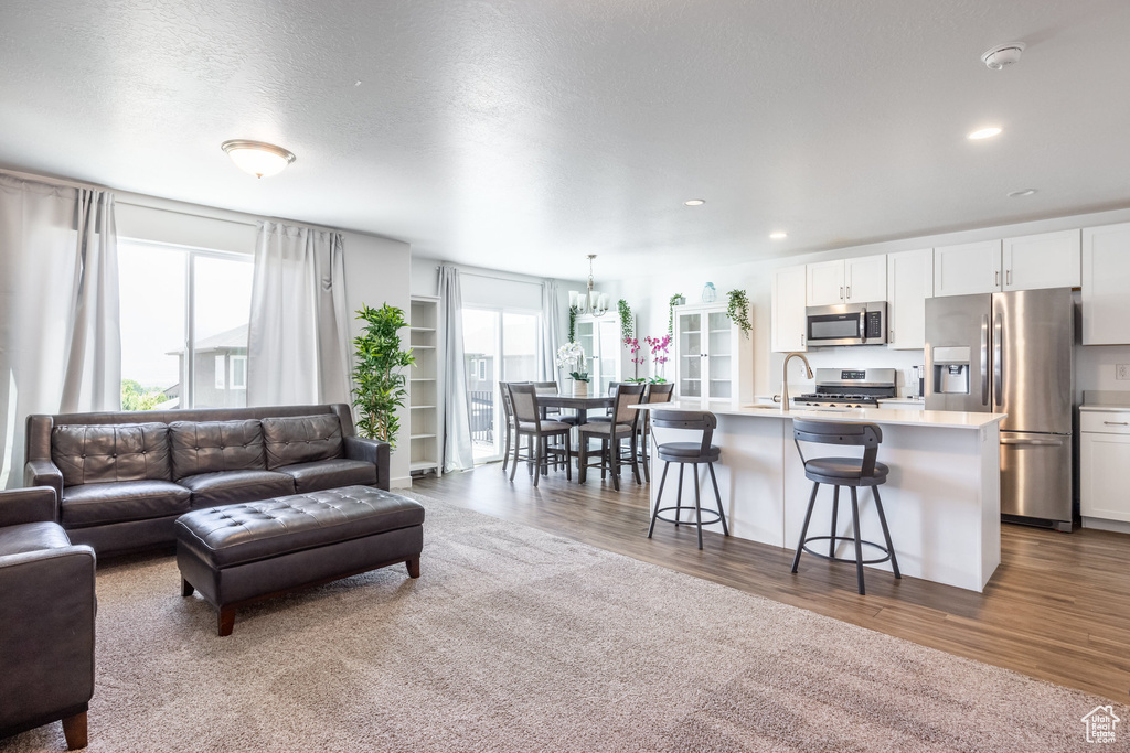 Living room with hardwood / wood-style floors