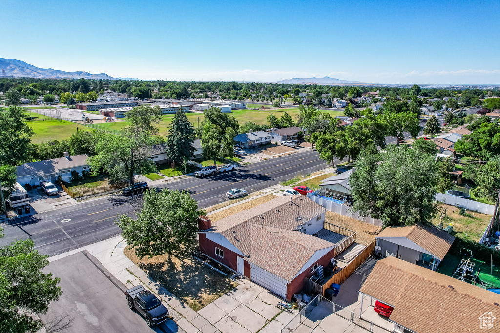 Birds eye view of property with a mountain view