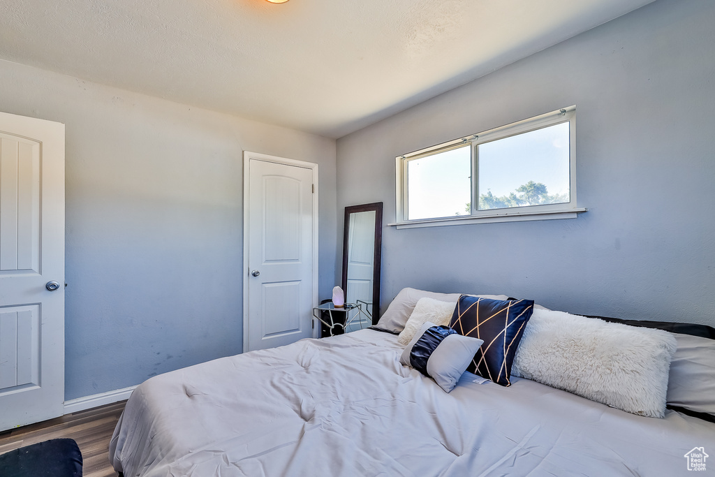 Bedroom featuring hardwood / wood-style floors