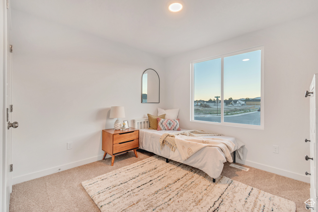 View of carpeted bedroom