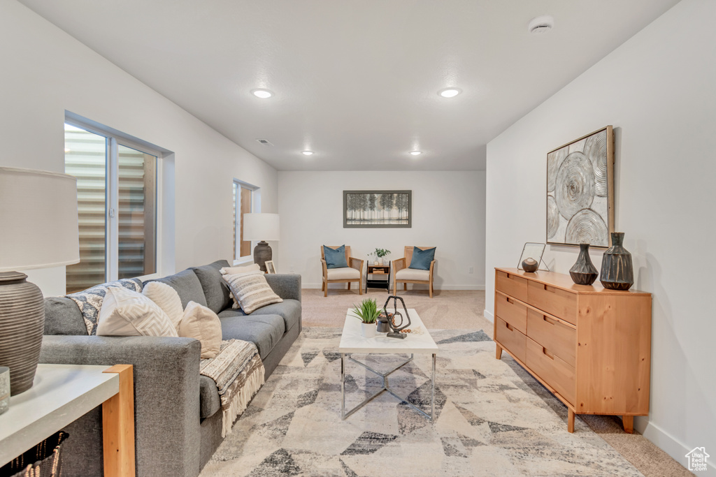 Living room with light colored carpet