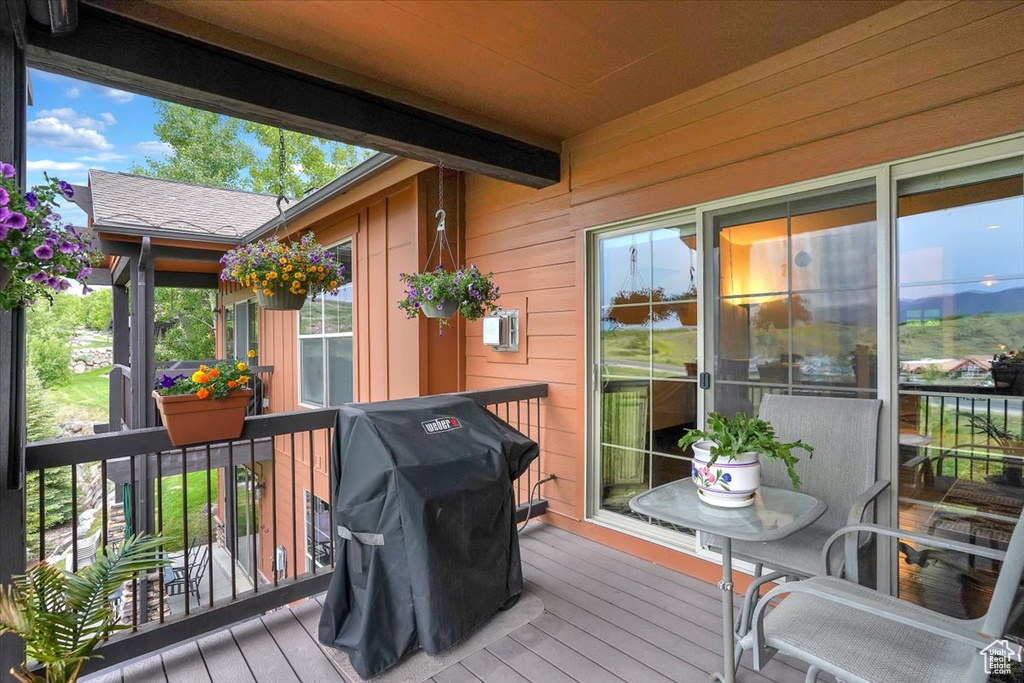 Deck featuring a grill
