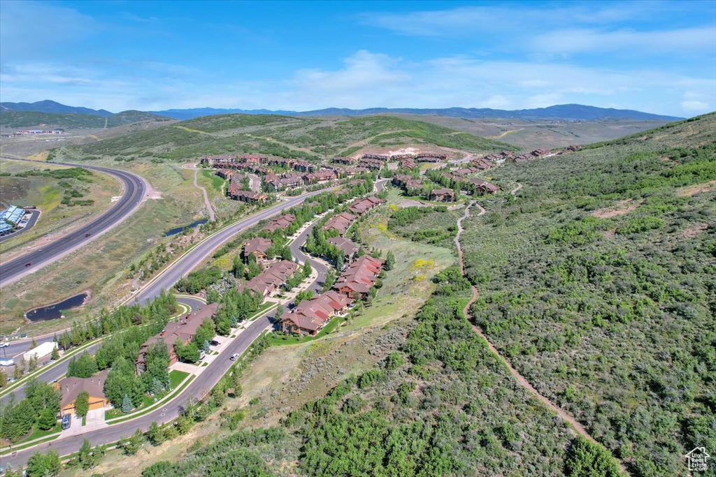 Drone / aerial view featuring a mountain view