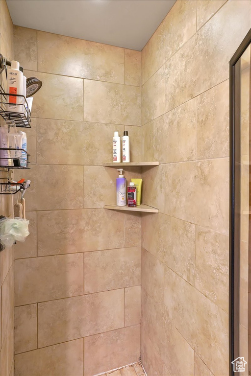 Bathroom with a tile shower