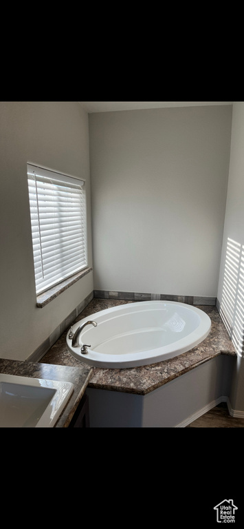 Bathroom featuring a bath