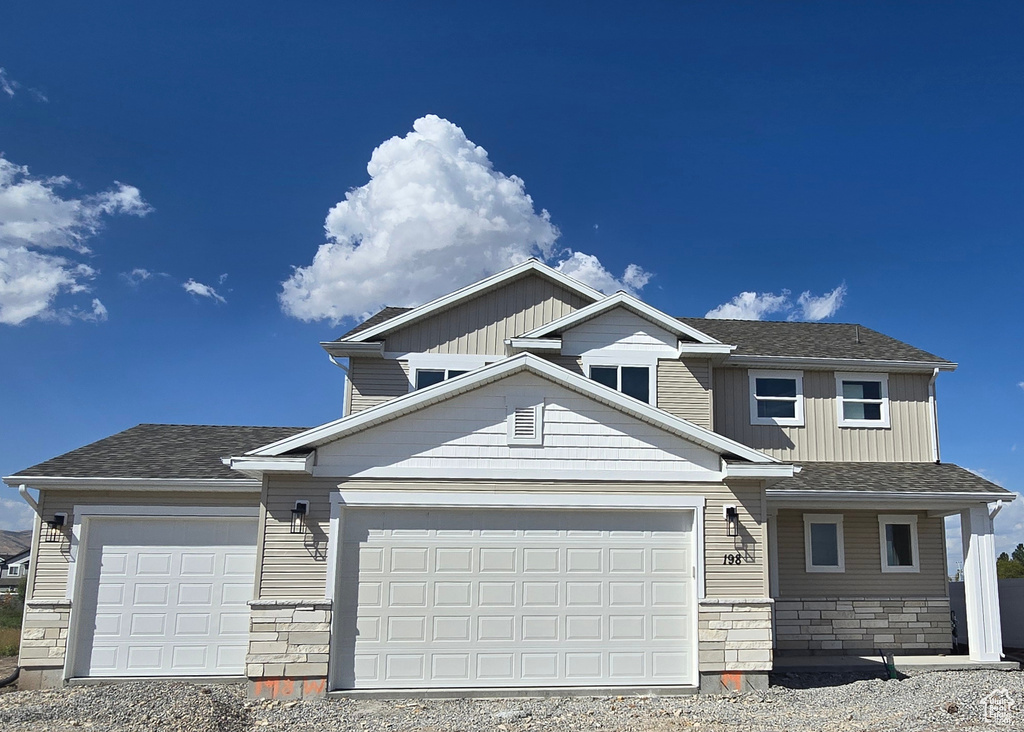 View of front facade with a garage