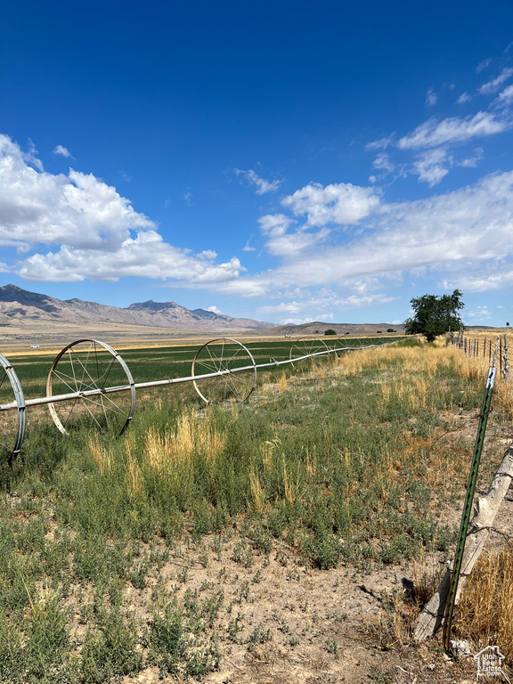 Property view of mountains with a rural view