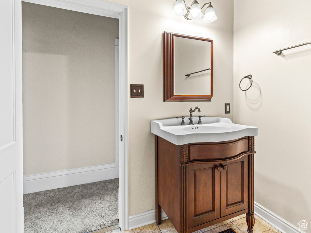 Bathroom with tile floors and vanity