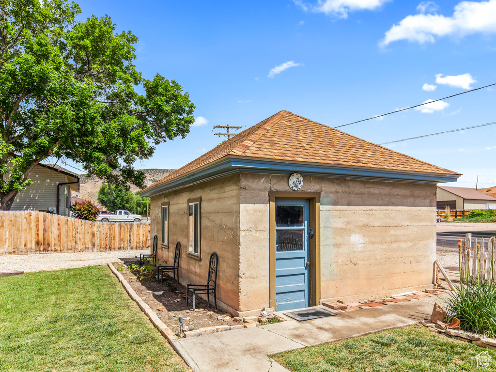 Exterior space featuring a lawn