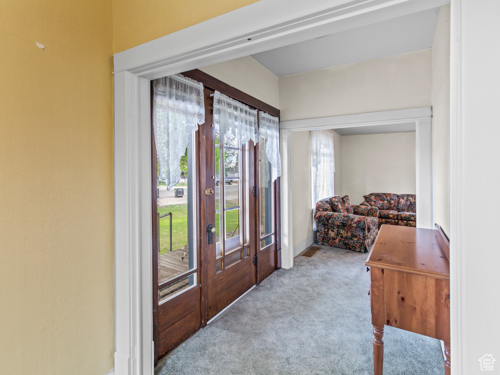 View of carpeted entrance foyer