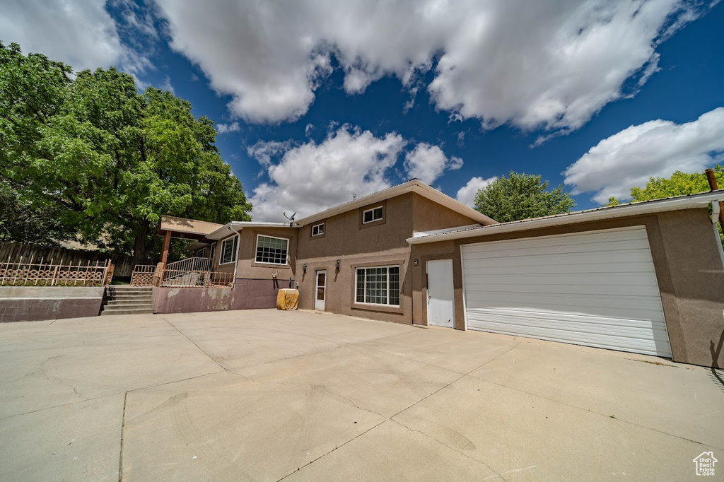 View of front of property with a garage