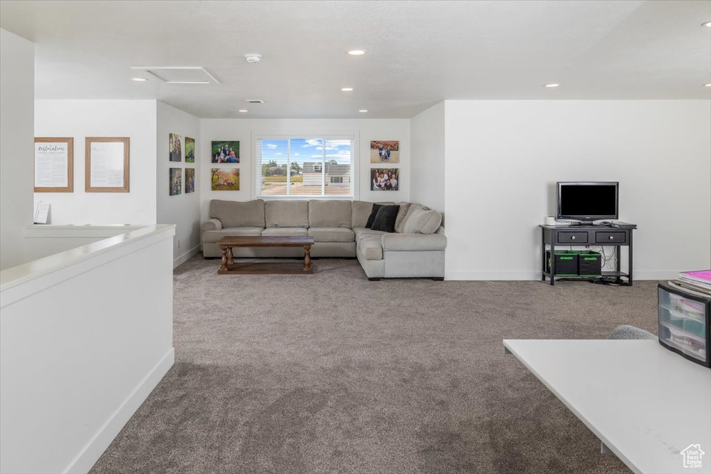 Living room featuring carpet floors