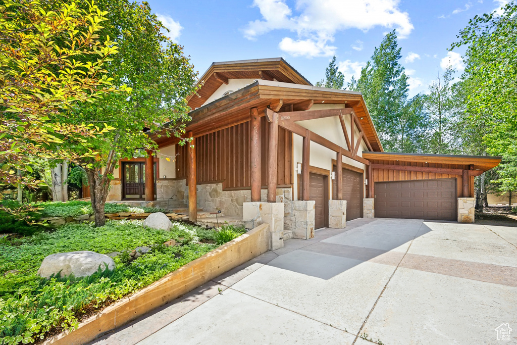 View of front of property featuring a garage