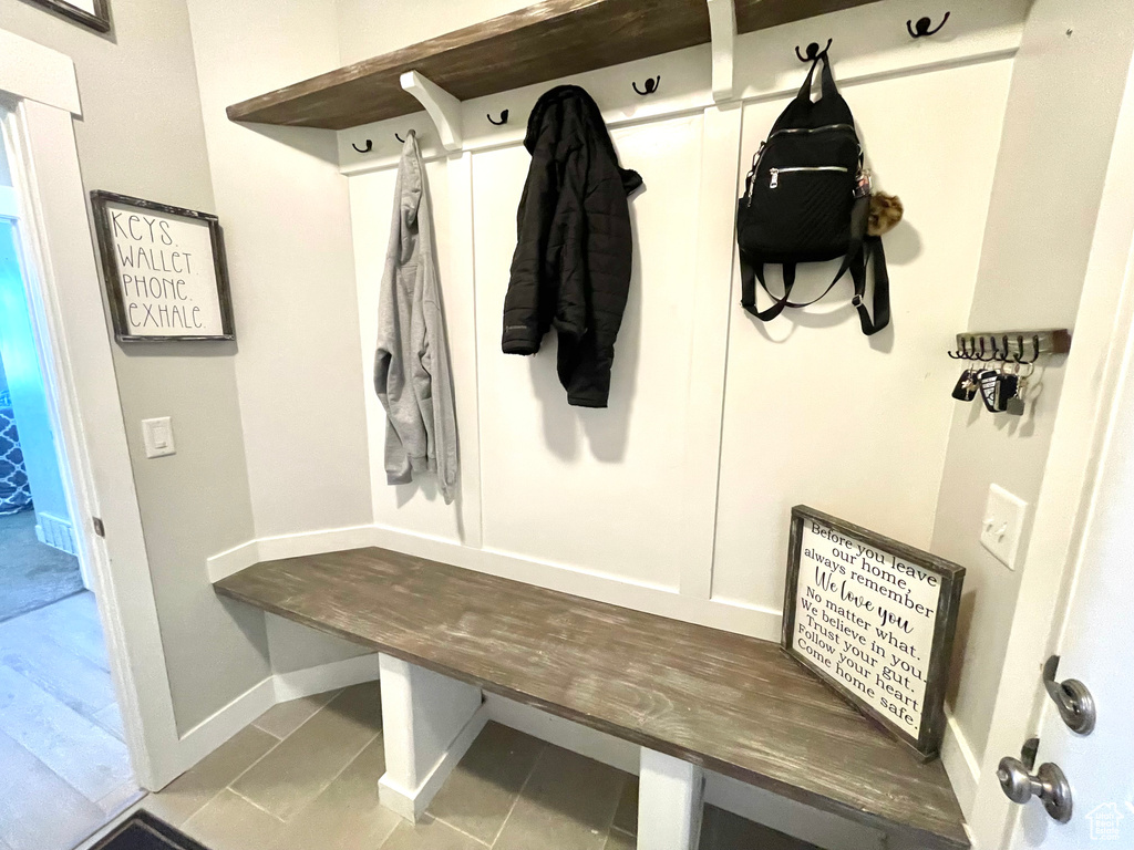 Mudroom with hardwood / wood-style floors