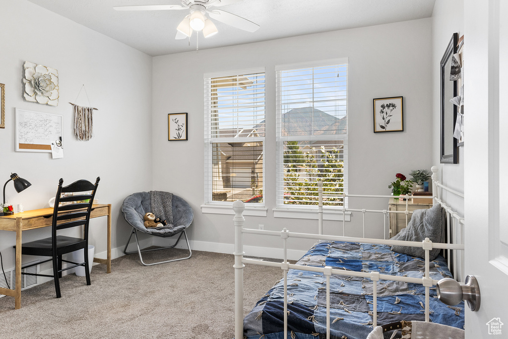 Bedroom with carpet floors and ceiling fan