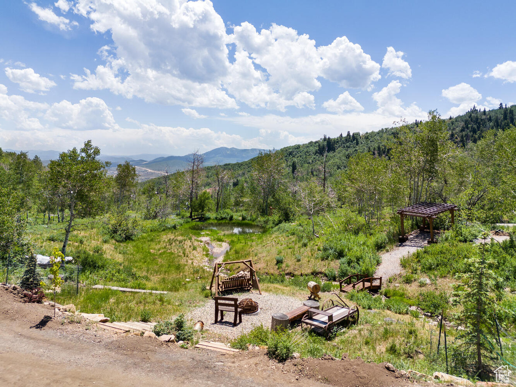 View of mountain feature with a water view