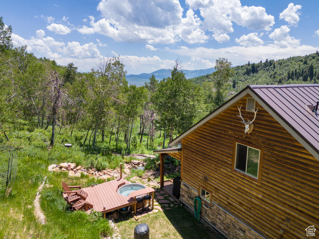 Exterior space featuring a mountain view