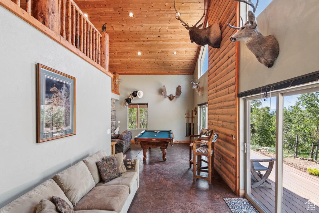 Rec room with high vaulted ceiling, plenty of natural light, billiards, and wooden ceiling