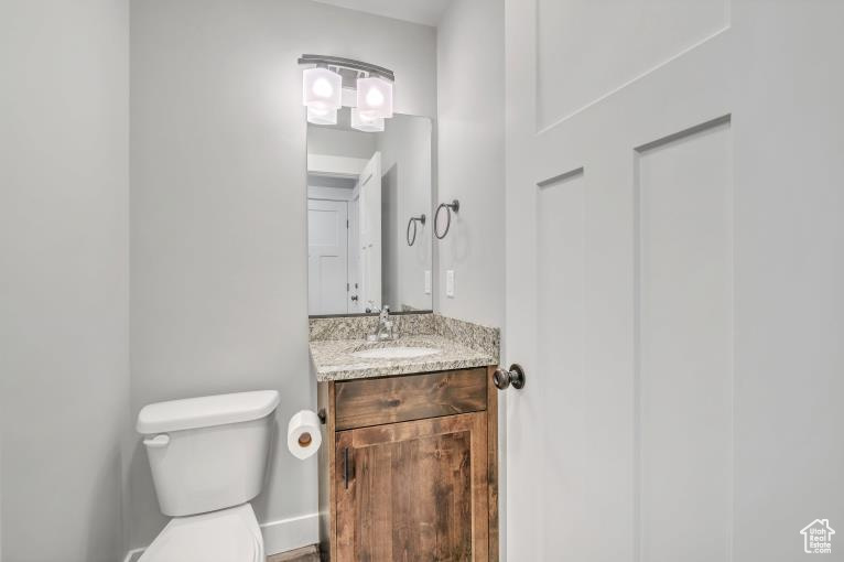 Bathroom with vanity and toilet