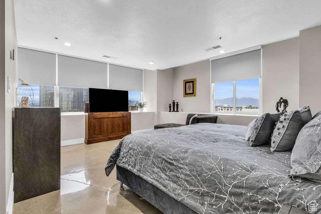 Bedroom featuring a textured ceiling