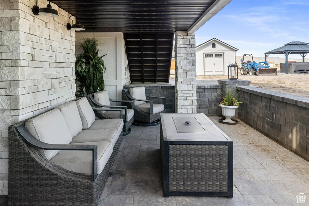 View of patio with an outdoor living space