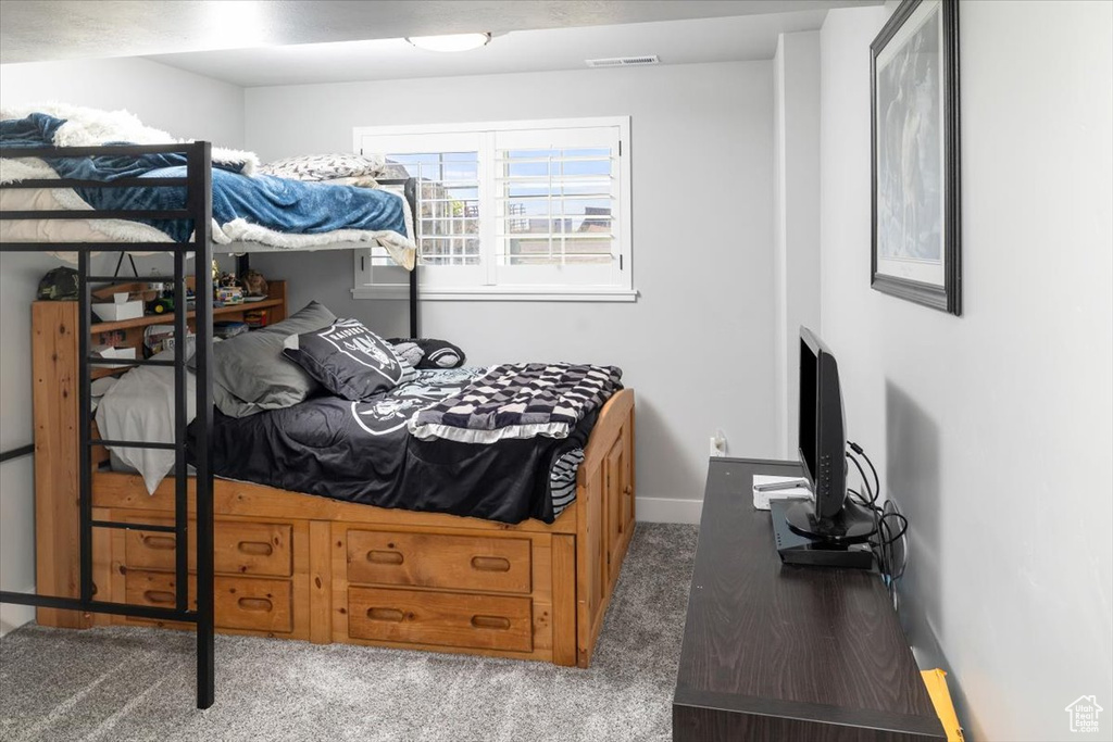 Bedroom featuring carpet floors