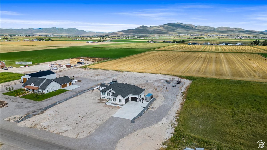 Drone / aerial view with a mountain view and a rural view